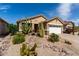 Home with well-maintained desert landscaping and a two-car garage at 202 W Twin Peaks Pkwy, San Tan Valley, AZ 85143