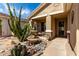 Attractive desert landscaping featuring an outdoor fountain and lush cacti at 202 W Twin Peaks Pkwy, San Tan Valley, AZ 85143