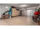 Garage with cabinets and epoxy floor at 202 W Twin Peaks Pkwy, San Tan Valley, AZ 85143