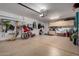 Garage with cabinets and an epoxy floor at 202 W Twin Peaks Pkwy, San Tan Valley, AZ 85143