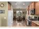 Kitchen with tile floors, stainless steel appliances, and wooden cabinets at 202 W Twin Peaks Pkwy, San Tan Valley, AZ 85143