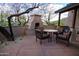 Inviting outdoor area with a fireplace, perfect for entertaining and relaxation at 202 W Twin Peaks Pkwy, San Tan Valley, AZ 85143