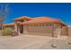 Charming single-story home featuring a tile roof and a two-car garage at 2149 S Olivewood --, Mesa, AZ 85209