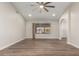 Spacious living room featuring wood floors, high ceilings, and ample natural light at 2149 S Olivewood --, Mesa, AZ 85209