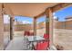 Covered patio with outdoor furniture, ideal for relaxing and entertaining at 24848 W Kowalsky Ln, Buckeye, AZ 85326