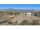 Community entrance with mountains in the background at 2650 E Dutchmans Trl, Apache Junction, AZ 85119