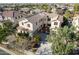 Stunning two-story home featuring a well-manicured yard, desert landscaping, and a paver-stone entryway at 2830 E Janelle Way, Gilbert, AZ 85298