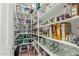 Walk-in pantry boasts ample shelving for storage at 2830 E Janelle Way, Gilbert, AZ 85298