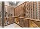 Spacious wine cellar with custom wooden racks and ample storage at 29501 N 76Th St, Scottsdale, AZ 85266