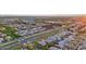 Panoramic aerial shot of a suburban development with orderly streets and tree-lined medians at 3482 E Cotton Ln, Gilbert, AZ 85234