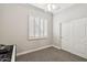 Bright bedroom featuring a ceiling fan, shutters, and sliding closet doors at 3482 E Cotton Ln, Gilbert, AZ 85234