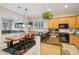 Bright kitchen featuring wooden cabinets, granite countertops, and stainless steel appliances at 3482 E Cotton Ln, Gilbert, AZ 85234