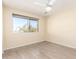 Bright bedroom with a large window and view of desert landscape at 4111 W Hayward Ave, Phoenix, AZ 85051