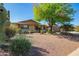 Beautiful single-Gathering home with xeriscaping, mature trees, and a welcoming entrance at 4111 W Hayward Ave, Phoenix, AZ 85051