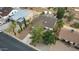 Aerial shot of a home with desert landscaping and a gravel yard in a residential area at 449 E Fred Ave, Apache Junction, AZ 85119