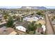 View of the home with desert landscaping and mountain views in a quiet neighborhood at 449 E Fred Ave, Apache Junction, AZ 85119