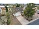 Overhead view of a single-Gathering home featuring a driveway, landscaping, and an attached garage at 449 E Fred Ave, Apache Junction, AZ 85119