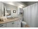 Bathroom featuring granite countertops and large mirror at 449 E Fred Ave, Apache Junction, AZ 85119