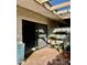 Outdoor patio featuring brick flooring, and lush potted plants at 4800 N 68Th St # 104, Scottsdale, AZ 85251