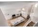 Aerial view of living room with white walls, large sectional, and a vaulted ceiling at 4931 E Paradise Ln, Scottsdale, AZ 85254