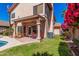 Outdoor patio with dining area and lush greenery, offering a perfect space for relaxation at 4931 E Paradise Ln, Scottsdale, AZ 85254