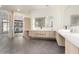 Bathroom featuring dual vanities, modern fixtures, and sleek design elements at 5127 N 71St St, Paradise Valley, AZ 85253