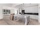 Kitchen featuring an island with pendant lights, modern white cabinets, and sleek design at 5127 N 71St St, Paradise Valley, AZ 85253