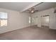 Bright bedroom featuring neutral walls, carpet, closet, and windows for plenty of light at 520 W Gibraltar Ln, Phoenix, AZ 85023