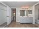 Bathroom featuring double sinks, granite countertop vanity, and tile flooring at 520 W Gibraltar Ln, Phoenix, AZ 85023