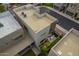 Overhead view of a modern home with a backyard garden and rooftop air conditioning units at 6804 E Lyra Dr, Scottsdale, AZ 85257