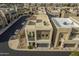 Aerial view of a modern home featuring desert landscaping and rooftop air conditioning units at 6804 E Lyra Dr, Scottsdale, AZ 85257