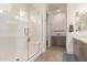 Modern bathroom features a glass shower enclosure, double sink vanity, and sleek fixtures at 6804 E Lyra Dr, Scottsdale, AZ 85257