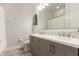 Modern bathroom featuring a double sink vanity, contemporary fixtures, and stylish wall decor at 6804 E Lyra Dr, Scottsdale, AZ 85257