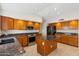 Kitchen featuring stainless steel appliances, granite counters and ample cabinetry at 7910 W Adobe Dr, Glendale, AZ 85308