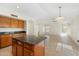 A bright kitchen with an island and lots of storage at 7910 W Adobe Dr, Glendale, AZ 85308