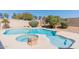 Private pool and spa oasis with desert landscaping for relaxation and outdoor enjoyment at 7910 W Adobe Dr, Glendale, AZ 85308