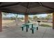 Community picnic area with green picnic table and grill at 8005 S 69Th Ln, Laveen, AZ 85339