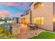 Backyard featuring a built-in barbecue, dining area, and a view of the pool at 8432 S 21St Pl, Phoenix, AZ 85042