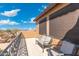 Sunny balcony with wrought iron railing and seating, perfect for enjoying the fresh air and views at 8432 S 21St Pl, Phoenix, AZ 85042