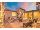 Cozy outdoor patio area with comfortable seating and a fire pit, perfect for relaxation at 8432 S 21St Pl, Phoenix, AZ 85042