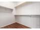 Walk-in closet with rod and shelf at 9041 E Ivyglen Cir, Mesa, AZ 85207