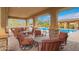 Covered seating near the community pool area, perfect for relaxation and social gatherings at 9041 E Ivyglen Cir, Mesa, AZ 85207