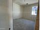 Bedroom with one window under construction at 9614 W Parkway Dr, Tolleson, AZ 85353