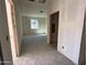 Living room features white walls and a window at 9614 W Parkway Dr, Tolleson, AZ 85353