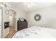 Bedroom boasts a dresser with television, fireplace, and ceiling fan at 9857 E Fairview Ave, Mesa, AZ 85208