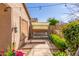 Patio featuring a covered porch swing with nice landscaping at 9857 E Fairview Ave, Mesa, AZ 85208