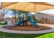 Community playground with a shade cover and slides at 9857 E Fairview Ave, Mesa, AZ 85208