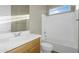 Bathroom with a bathtub, toilet, and vanity at 10144 E Thistle Ave, Mesa, AZ 85212