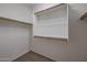 Walk-in closet features built-in shelving and ample storage space at 11725 W Jefferson St, Avondale, AZ 85323