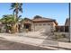 Inviting single-level home showcasing a two-car garage and tidy desert landscaping at 11725 W Jefferson St, Avondale, AZ 85323